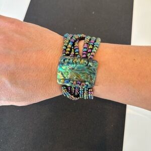 Iridescent Beaded Stretch Bracelet with Abalone Centerpiece